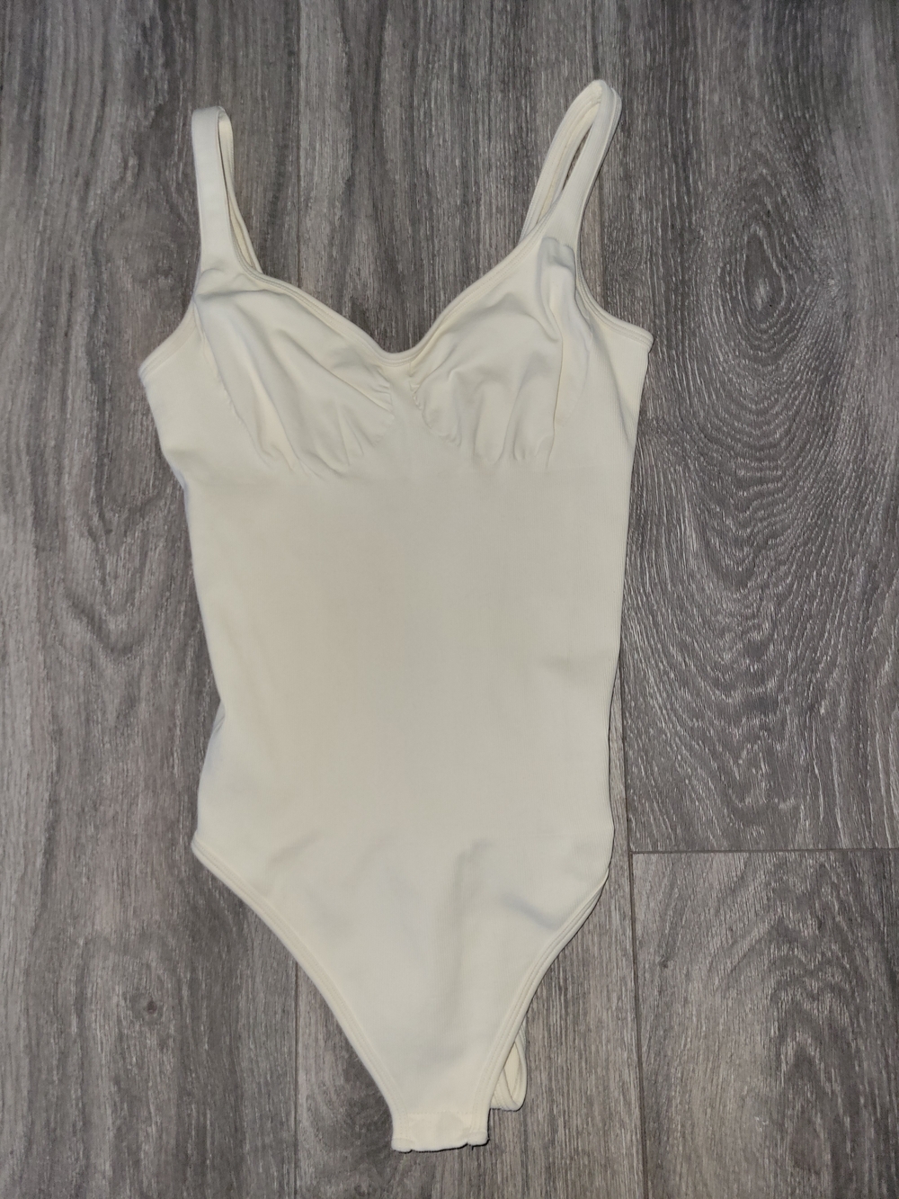 Cream One-Piece Bodysuit